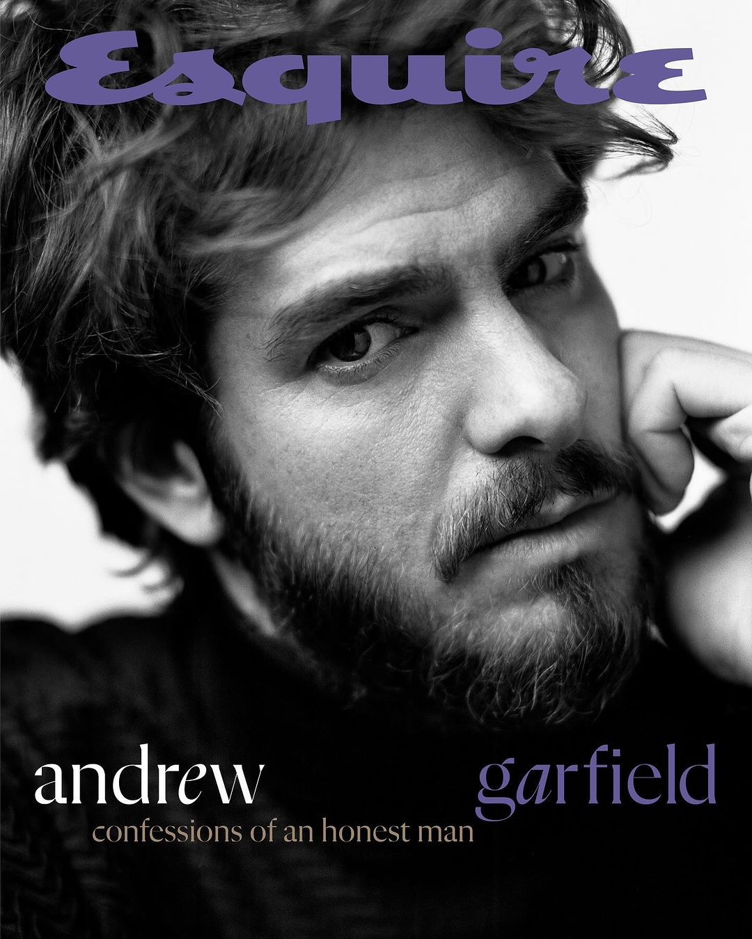 Black-and-white portrait of Andrew Garfield on the cover of Esquire magazine, head resting on his hand, thoughtful expression.