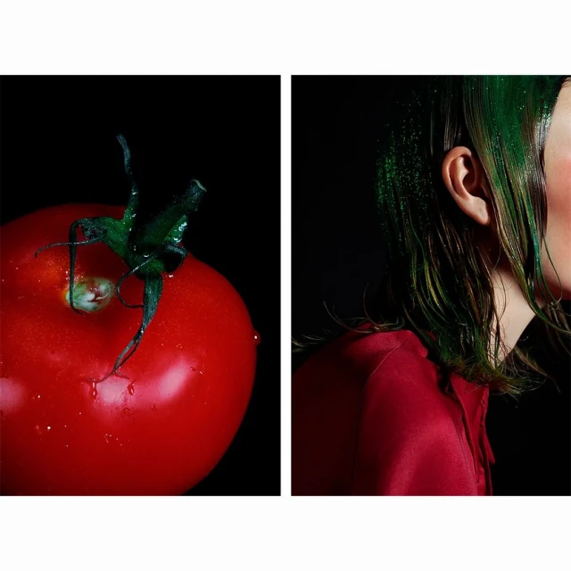 Artistic diptych: vibrant red tomato with green stem contrasts with a woman's profile, showcasing wet green hair and red blouse, set against black backdrop.