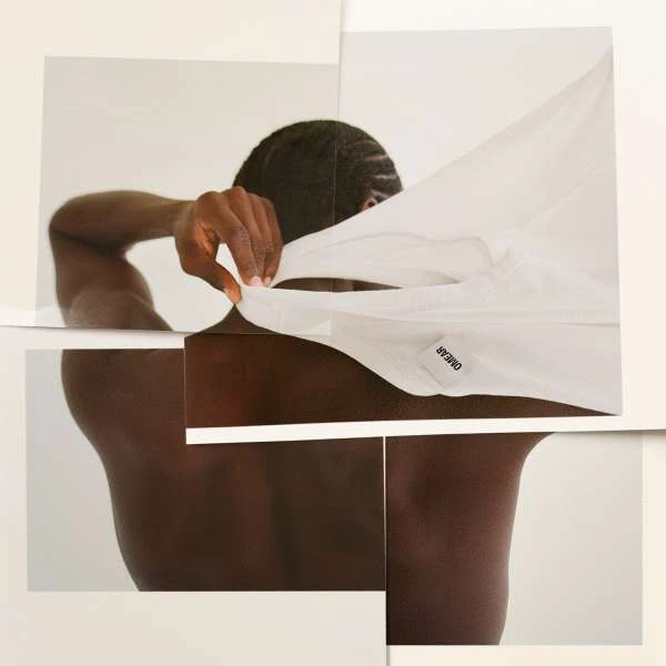 African-American man from the back takes off white button-down shirt in a collage with minimalist design. Focus on clothing and skin.