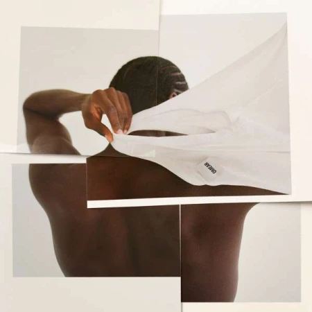 African-American man from the back takes off white button-down shirt in a collage with minimalist design. Focus on clothing and skin.