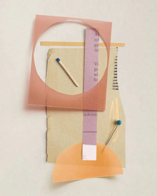 Abstract collage featuring geometric shapes, matchstick, sewing pin, and paper. Peach, beige, and lavender color palette on a white surface.