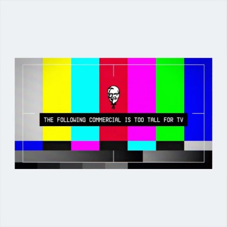 Television test pattern graphic with vertical bars of color and KFC logo, featuring text about commercial length. 