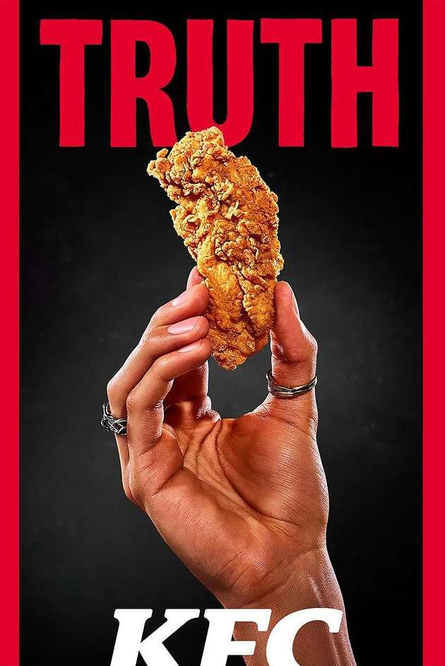 Hand holding fried chicken on a black background with red text reading 'Truth' and 'KFC', commercial food photography.