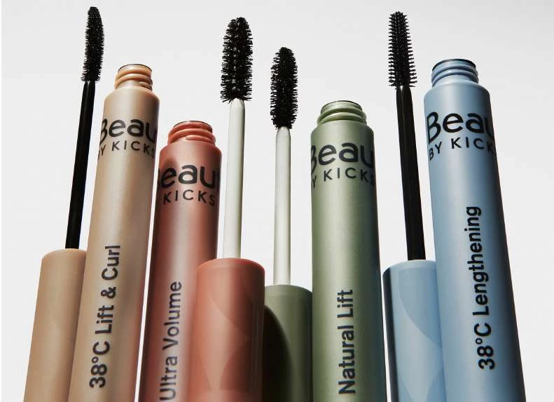 Studio shot of colorful Beauty by Kicks mascaras, including lift and curl, volume, natural lift, and lengthening varieties.