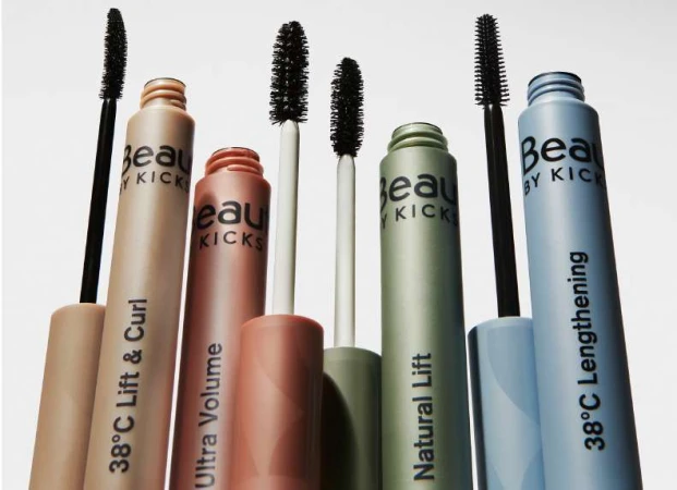 Studio shot of colorful Beauty by Kicks mascaras, including lift and curl, volume, natural lift, and lengthening varieties.