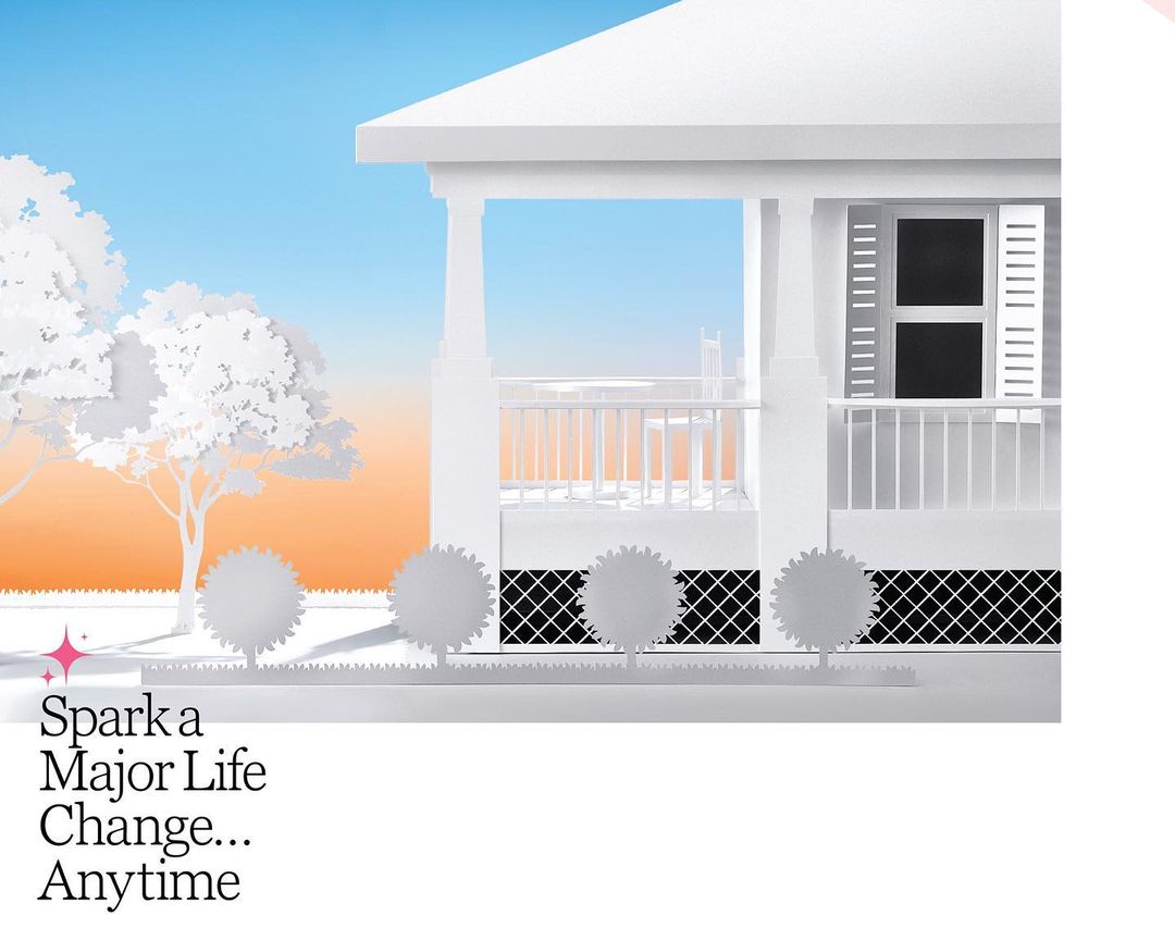 Paper art-style illustration of a white house with a porch, trees, and a blue and orange gradient sky in the background.