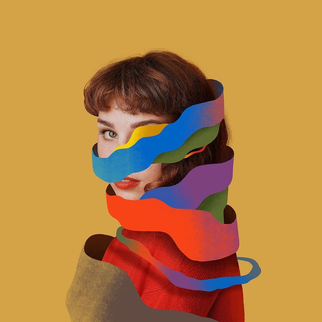 Portrait of a woman with fair skin and auburn hair, partially obscured by colorful paper strips, set against a golden yellow background.