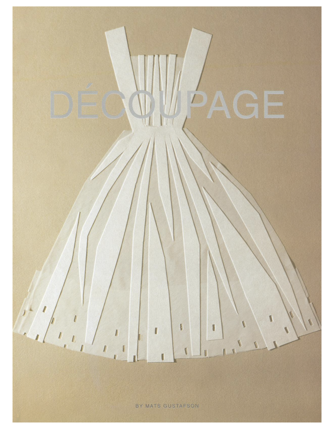 Collage of a white dress on a beige background. The dress is made of layered paper strips with text overlay "Découpage by Mats Gustafson".