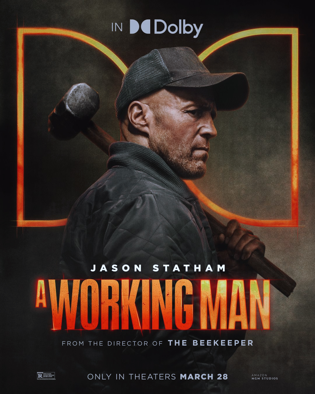Movie poster featuring Jason Statham in "A Working Man," wielding a sledgehammer, set against a dark background with Dolby logo.