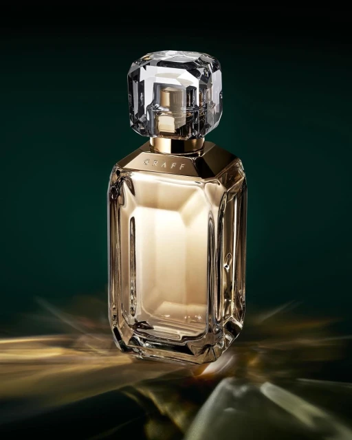 Elegant perfume bottle on a reflective surface against a dark green backdrop, showcasing luxury and sophisticated design.