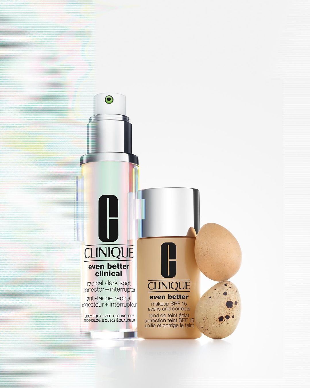 Clinique 'Even Better' skincare products: a clinical dark spot corrector and makeup with SPF 15, alongside two chicken eggs.