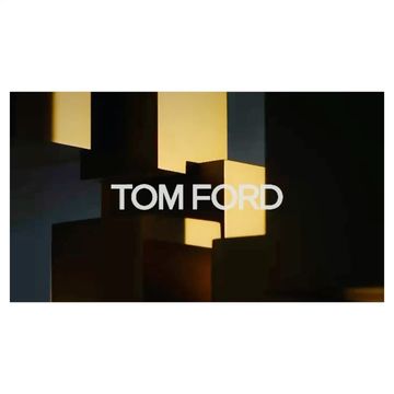 Geometric backdrop with shadows and lighting creates a stage for TOM FORD text in this abstract promotional composition.