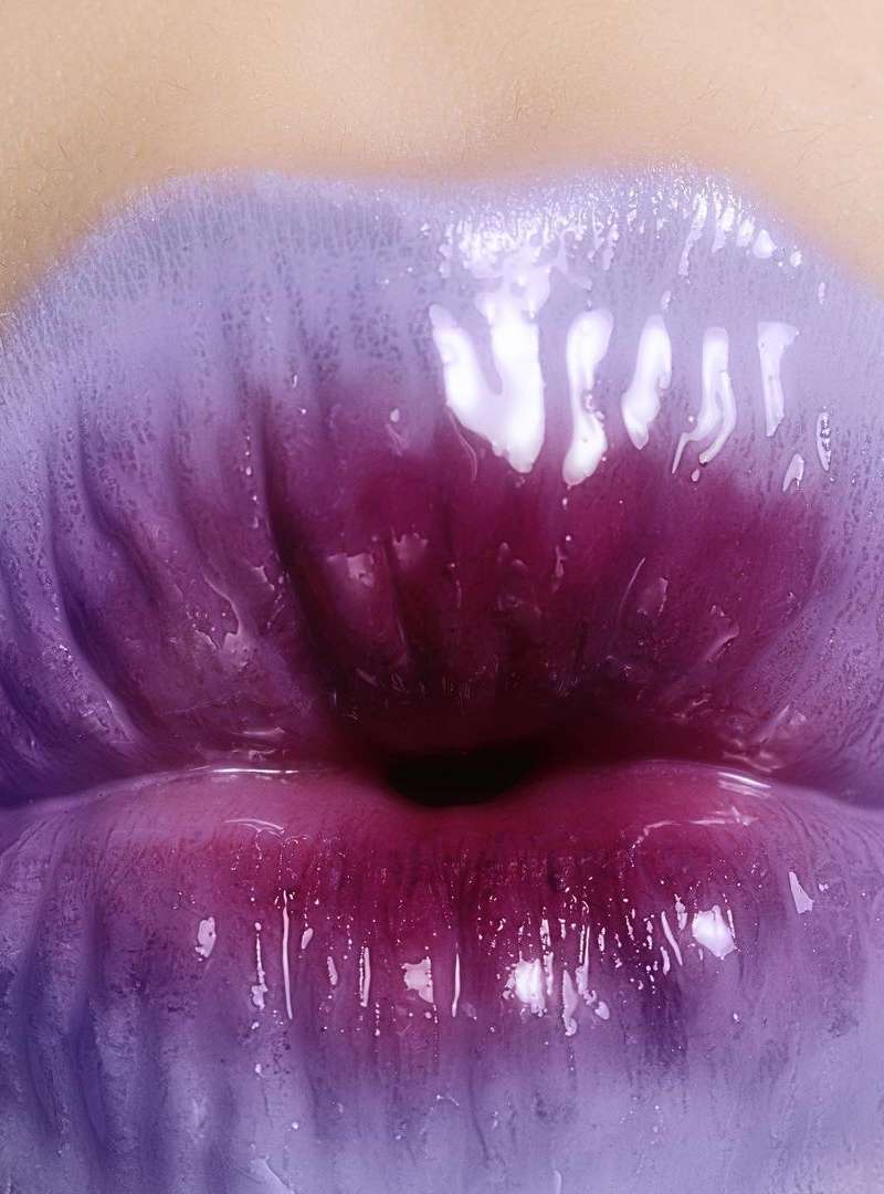Close-up of human lips with ombre color lipstick, glossy texture, studio lighting, beauty and fashion concept for visual search.