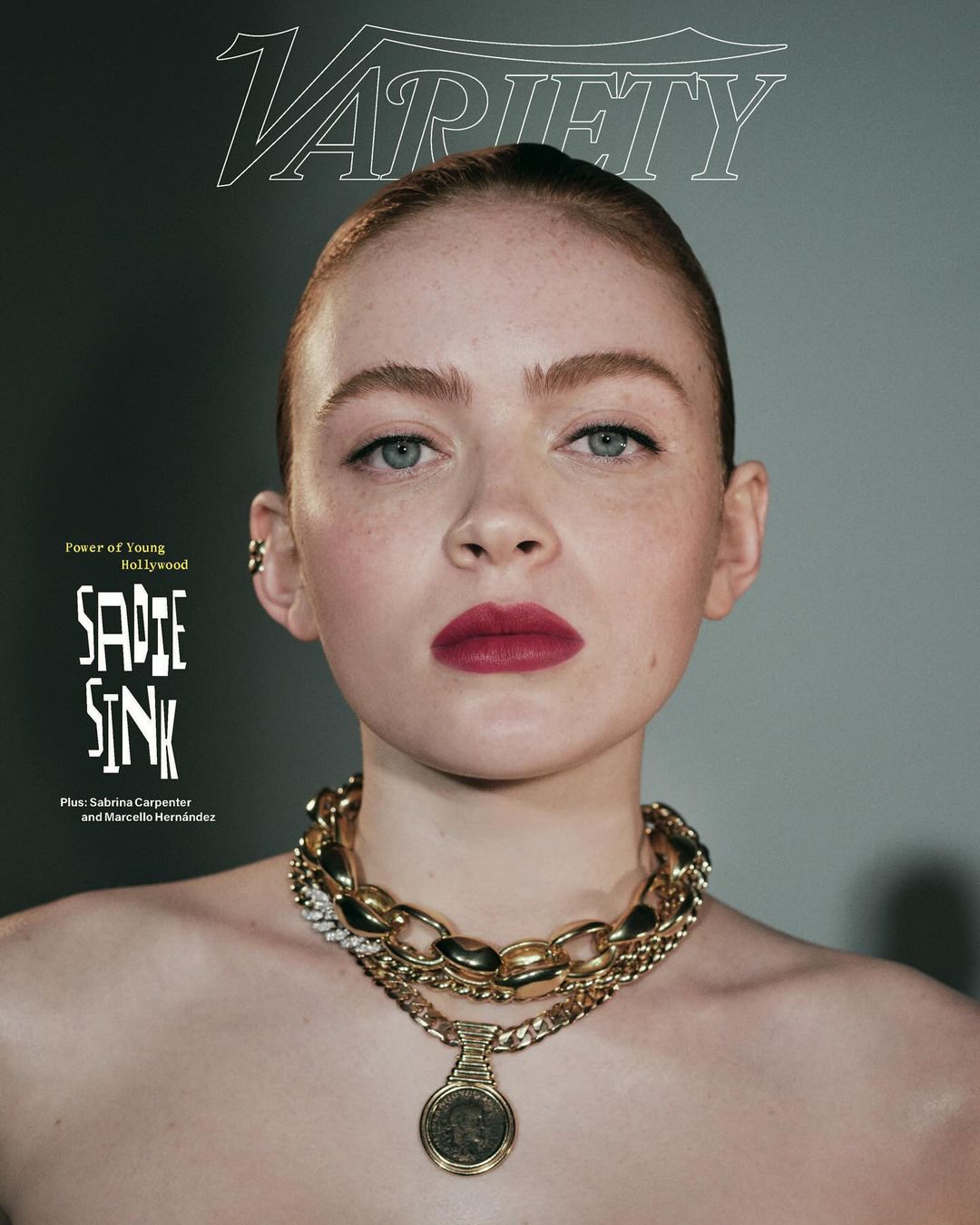 Close-up portrait of Sadie Sink on a Variety magazine cover, adorned with layered gold necklaces. Dark red lipstick accentuates her look.