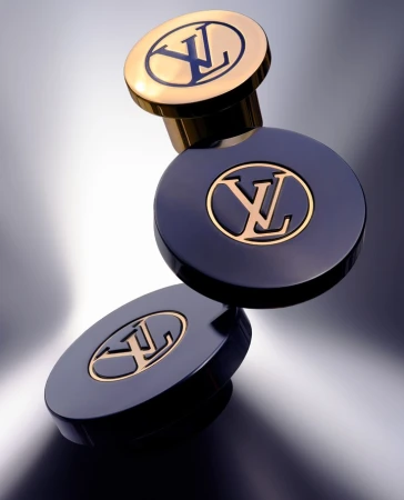 Luxury product shot: two-tone perfume bottles with the Louis Vuitton logo. Gold and navy blue create a sleek, high-end aesthetic.
