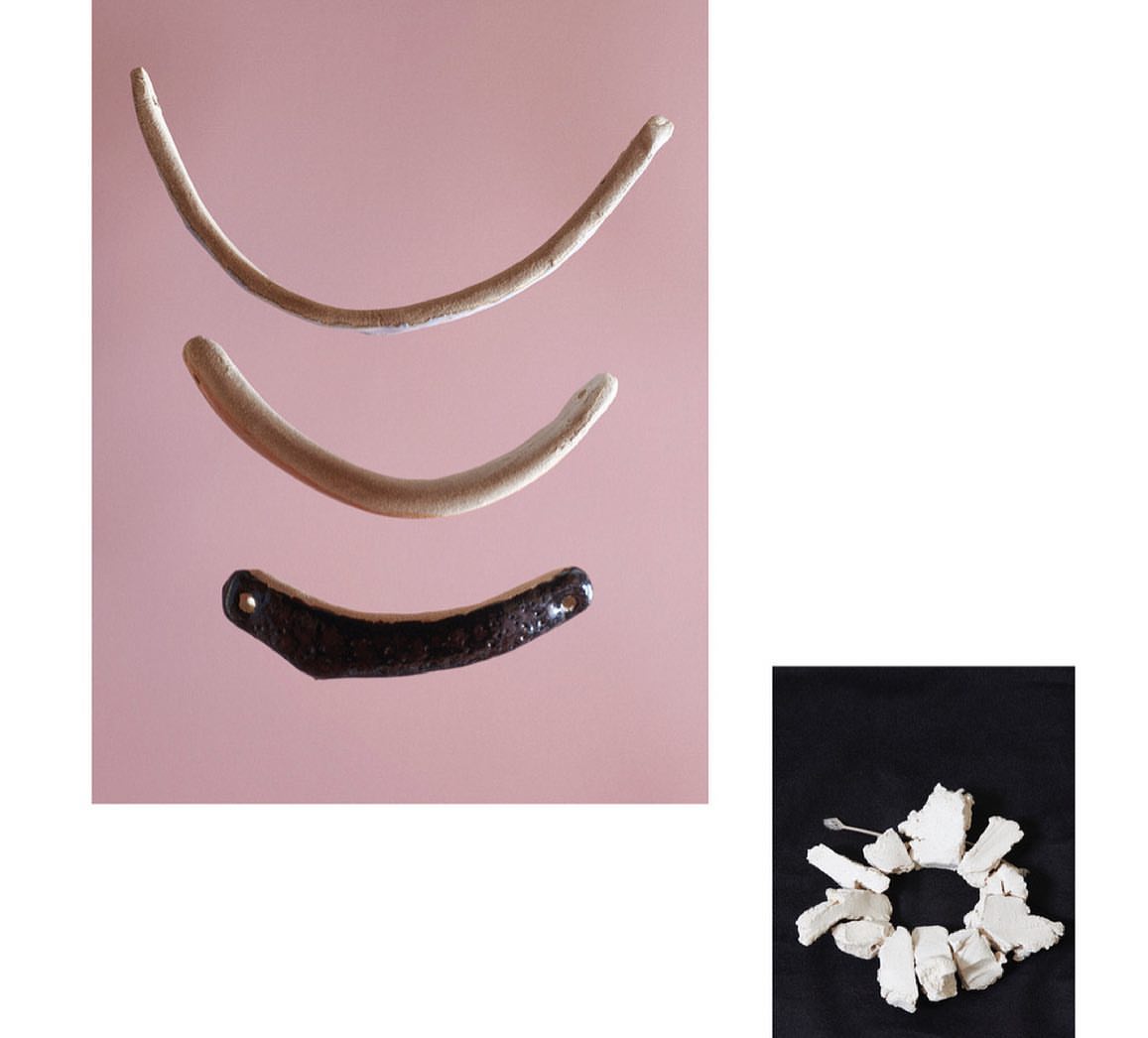 Arrangement of three curved objects and a deconstructed circular object. Abstract presentation on pink and black backdrops.