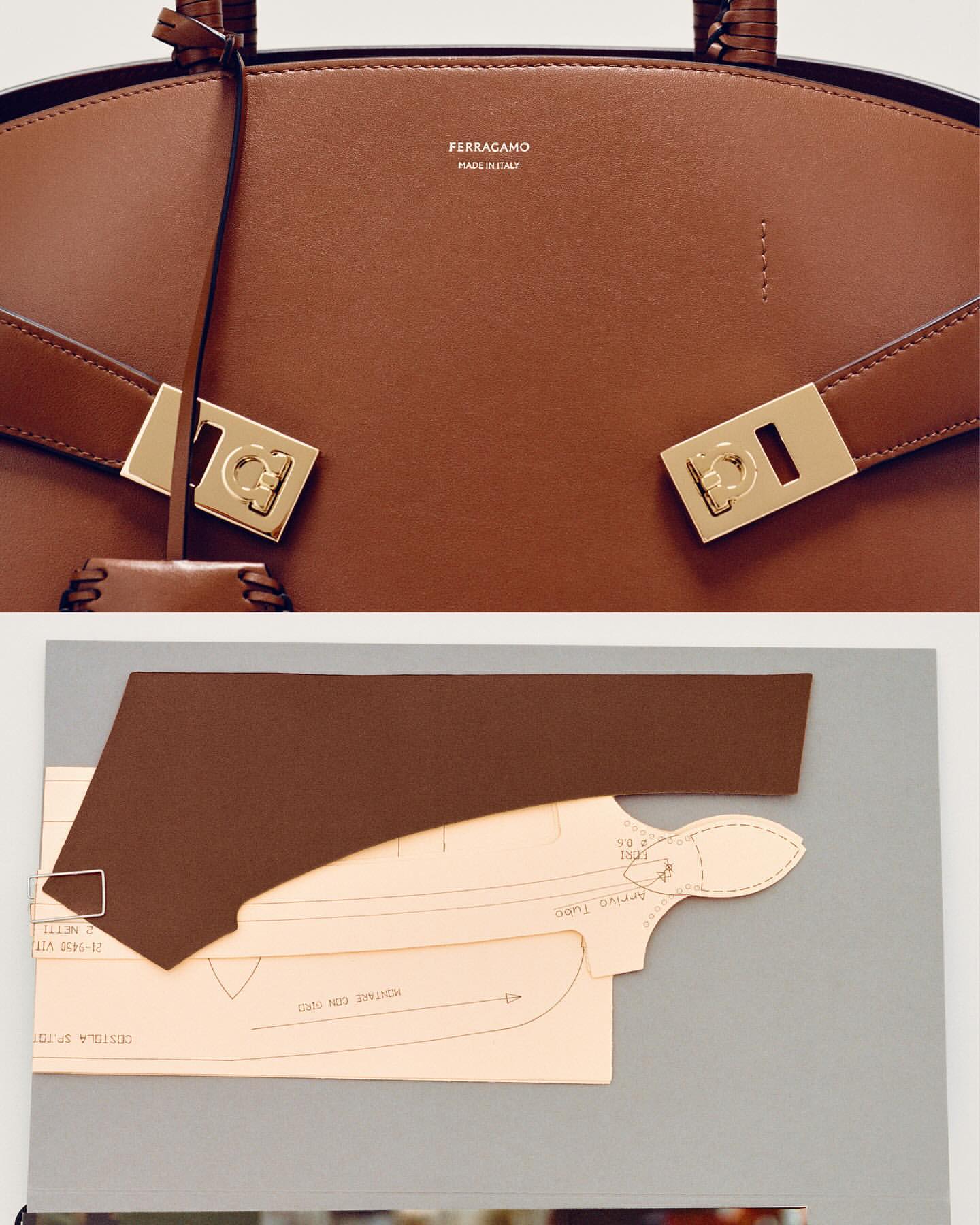 Close-up of a brown leather Ferragamo handbag, showcasing the luxury brand's craftsmanship and design details on a grey surface.