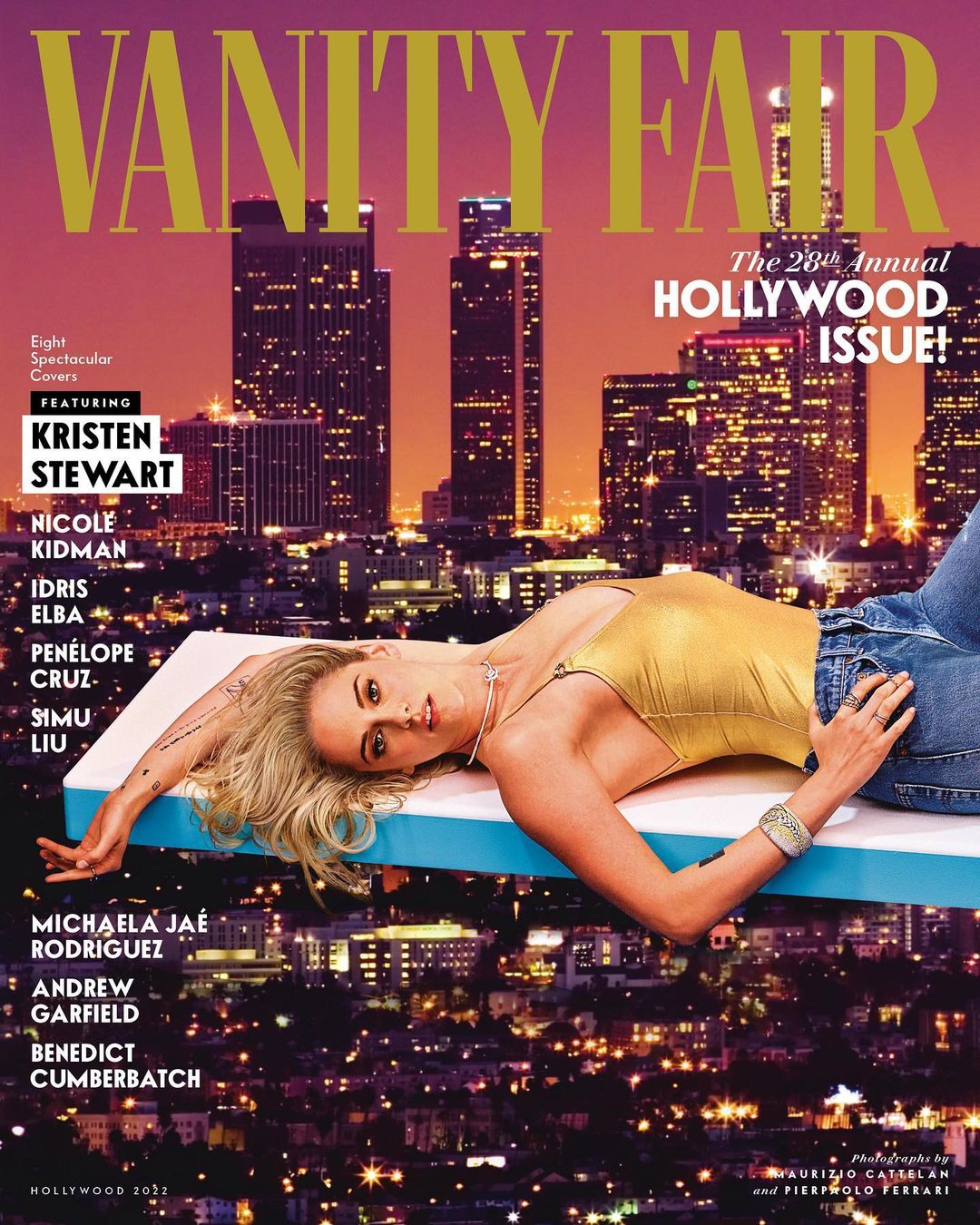 Vanity Fair cover featuring a blonde woman on a turquoise platform, set against a backdrop of city buildings at night.