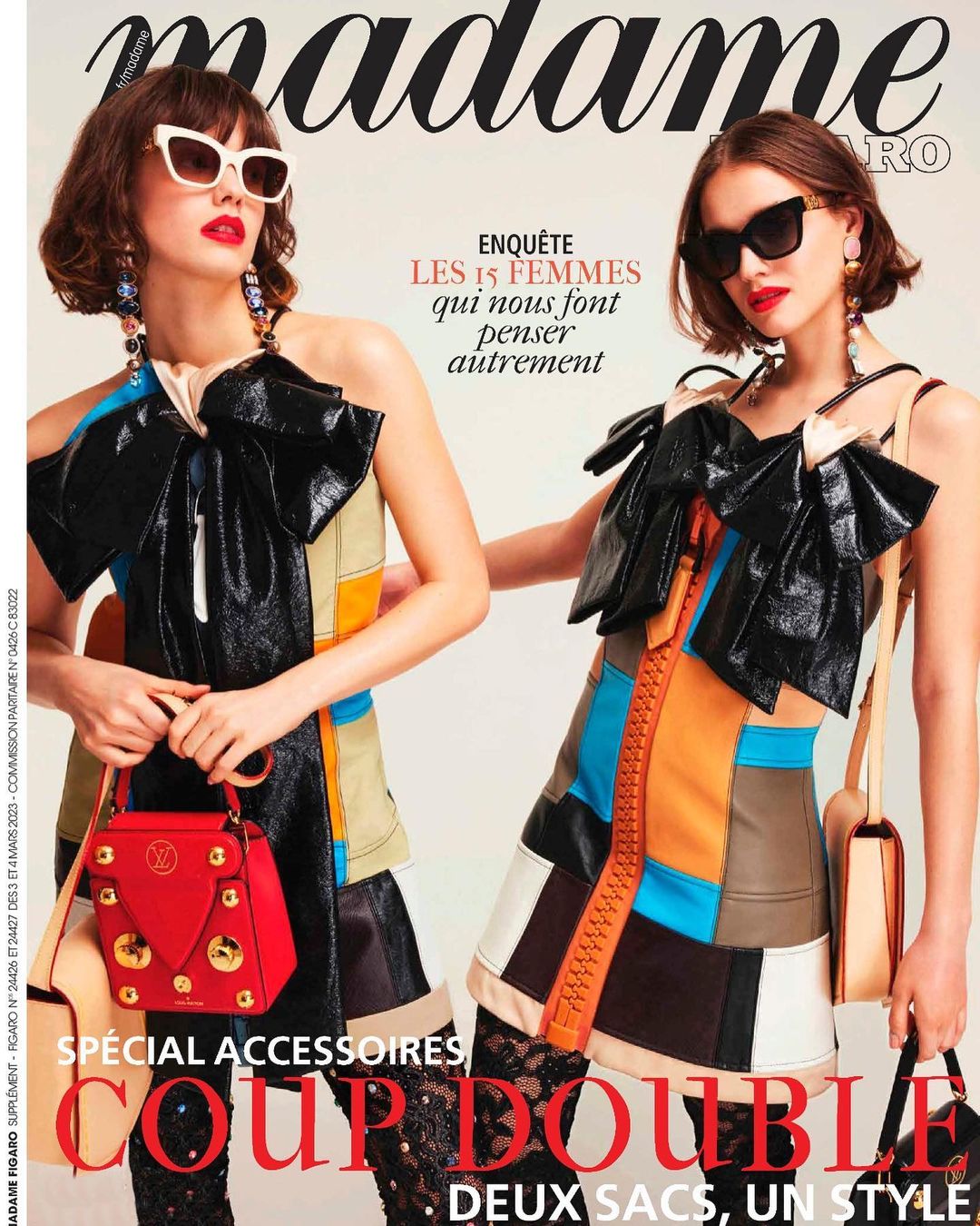 Magazine cover featuring two adult females with sunglasses, colorful dresses, bags, and the title 'madame FIGARO'. Fashion editorial.