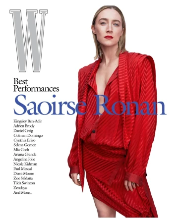Saoirse Ronan in a red jacket and skirt. Portrait for W Magazine Best Performances, posed in front of a white backdrop with magazine text.