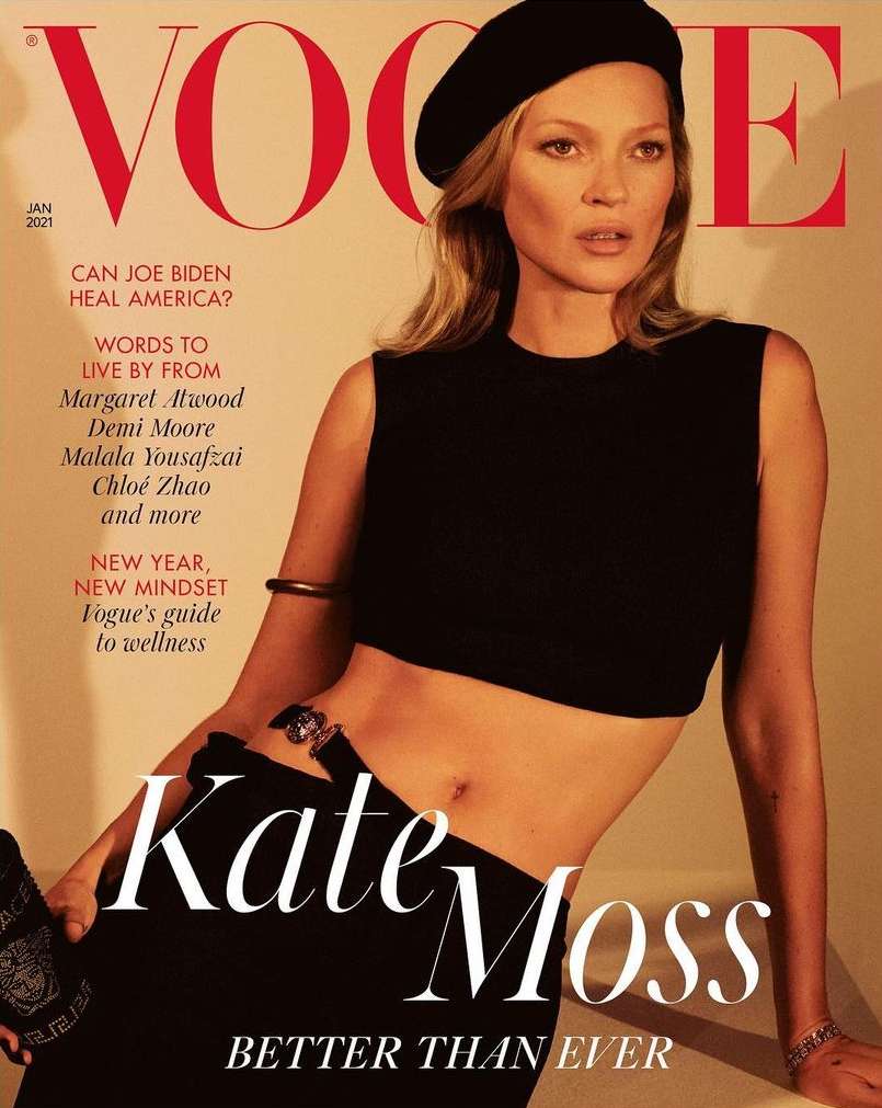Vogue cover featuring Kate Moss in a black beret and crop top against a peach backdrop with red and white text elements and brand logo.