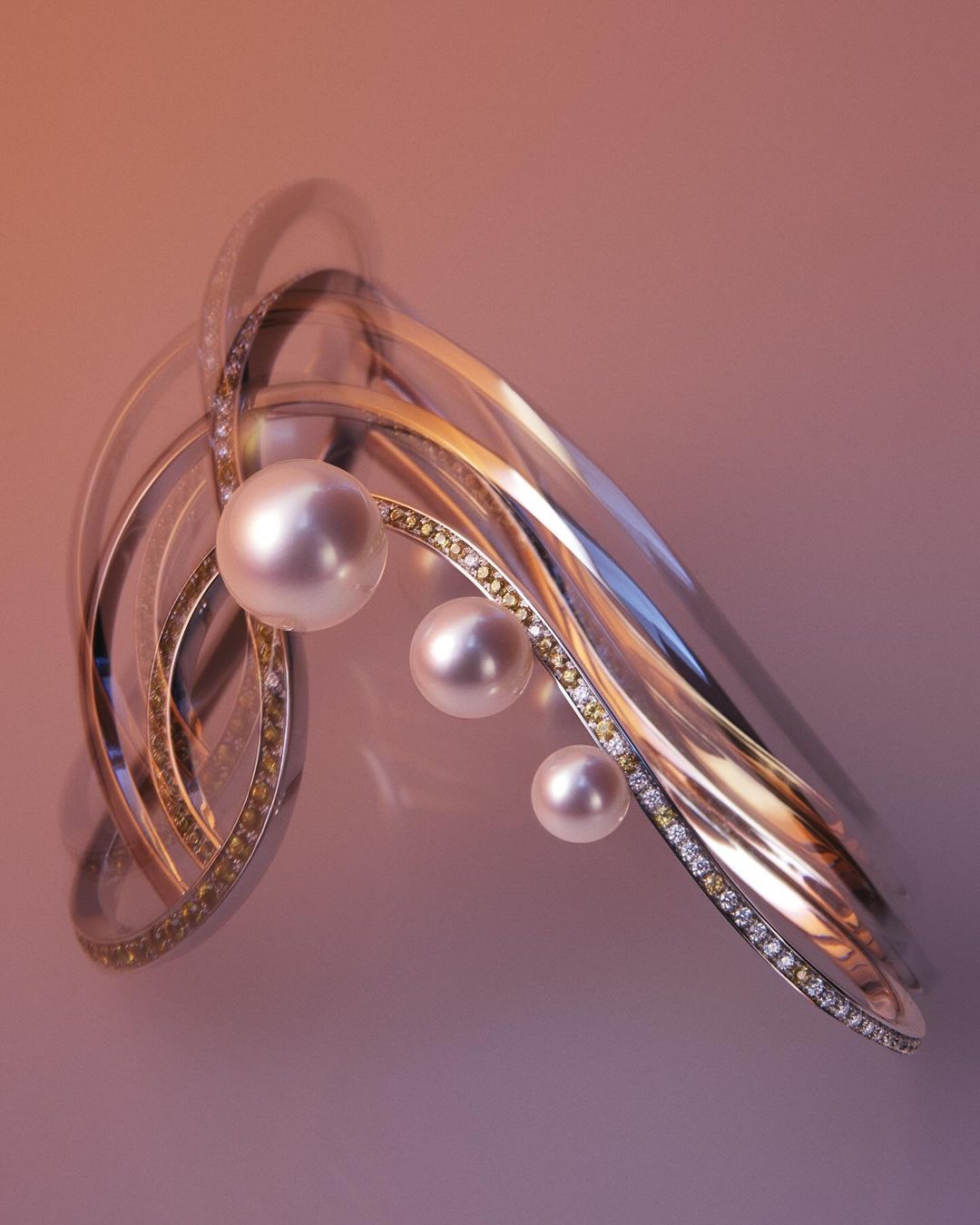Elegant pearl and diamond bracelet on reflective surface. Jewelry photography showcasing a luxury accessory with fine details and luminous pearls.