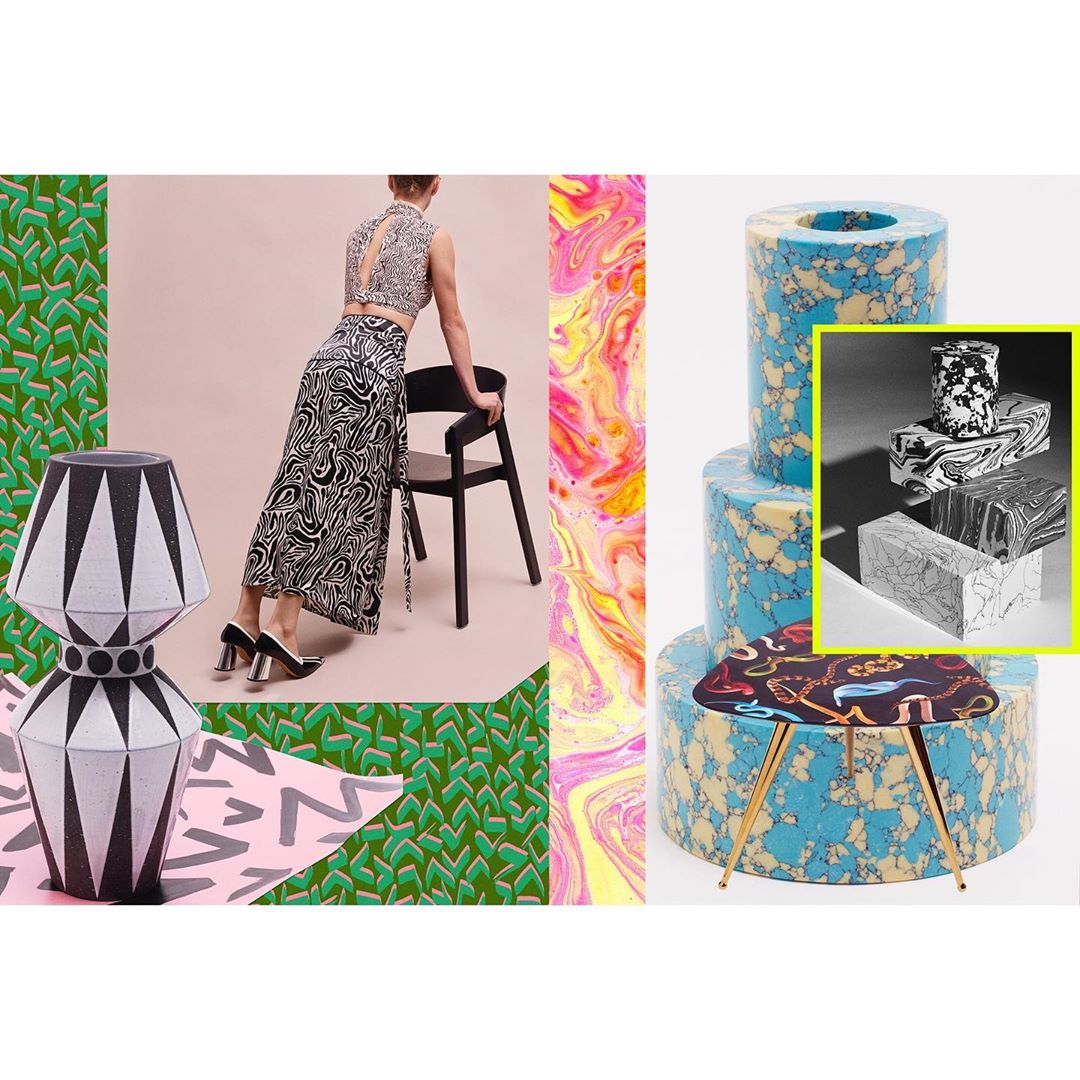 Fashion shot of a woman in a zebra-print skirt leaning on a chair, with modern furniture and colorful patterned backdrops in a studio.