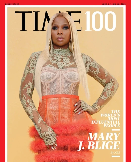 Mary J. Blige on Time 100 cover. She wears a light green lace top, peach corset, coral skirt with feathers, long blonde hair, earrings.