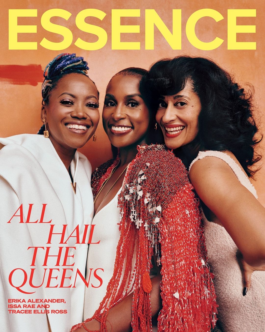 Essence magazine cover featuring Erika Alexander, Issa Rae, and Tracee Ellis Ross, all smiling and posing in front of an orange backdrop.