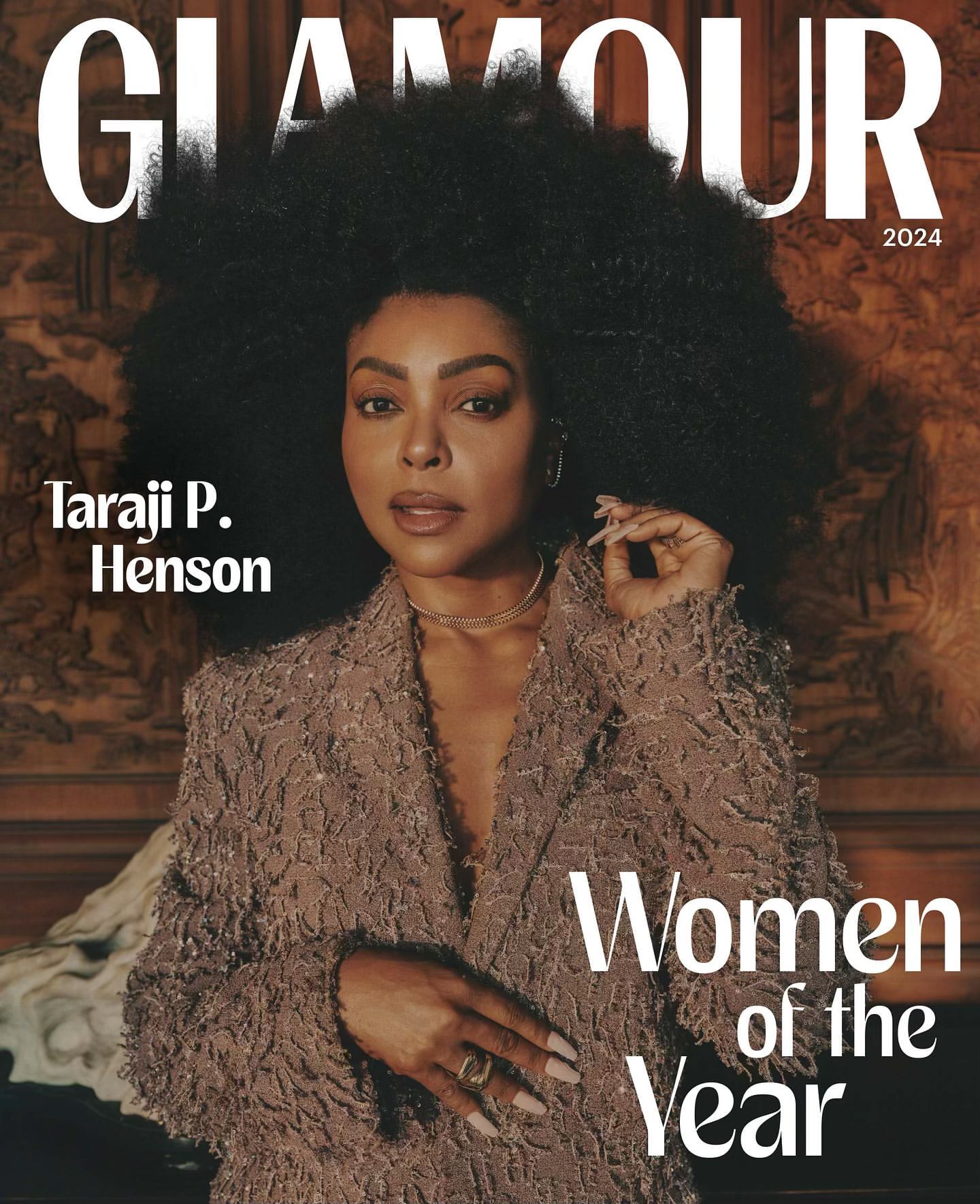 Glamour magazine cover featuring Taraji P. Henson in a textured coat, large afro hairstyle, gold jewelry, and a neutral colour palette.