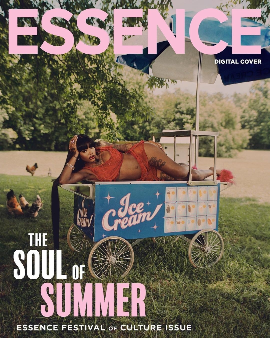 Essence magazine cover featuring a woman in orange lingerie lying on a blue ice cream cart in a grassy outdoor setting.