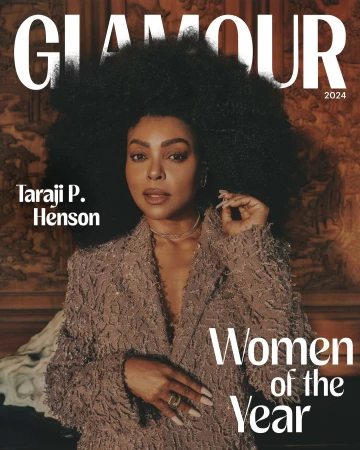Magazine cover featuring Taraji P. Henson with large afro, wearing a sparkly jacket, jewelry, and rings against a textured background.