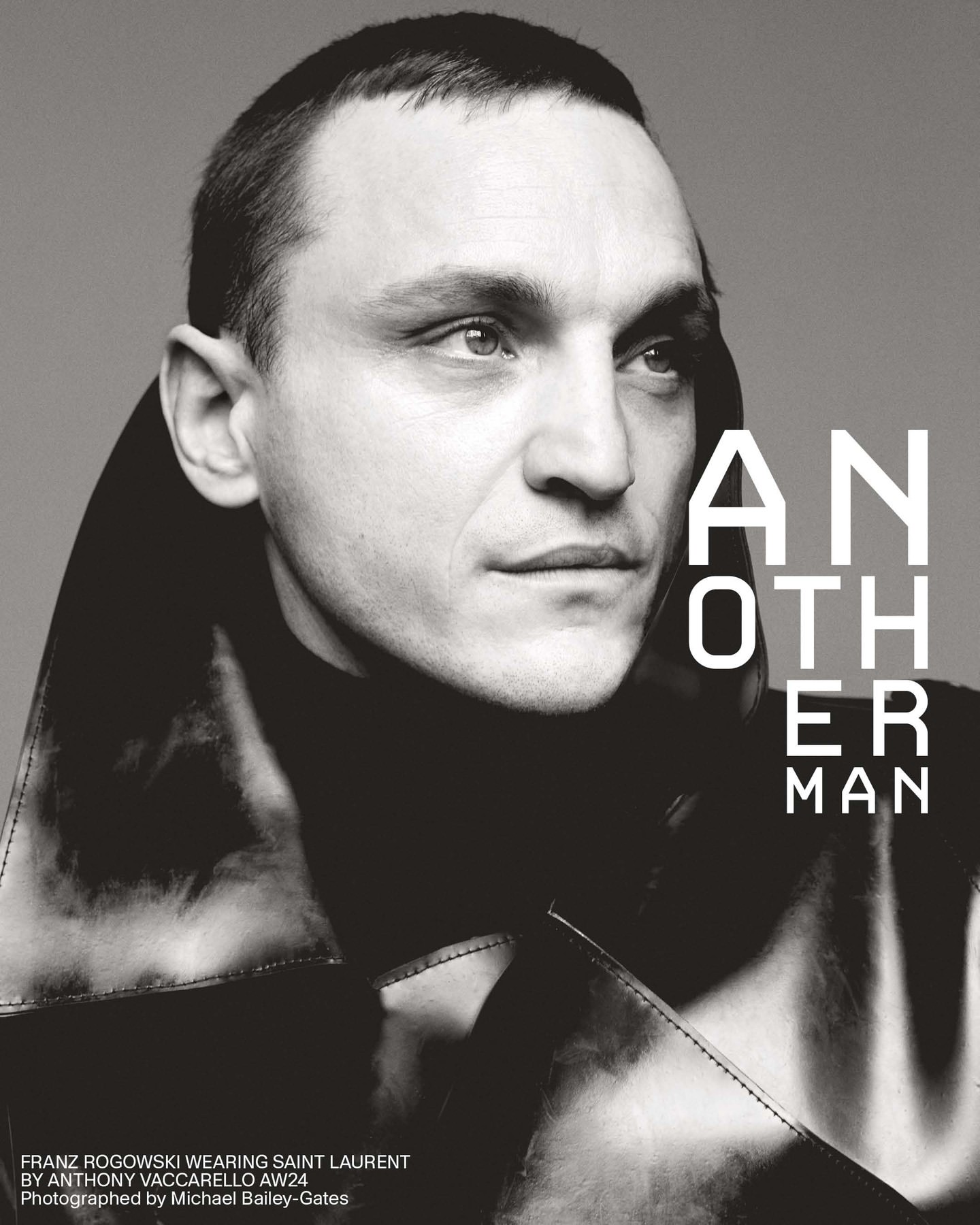 Headshot of Franz Rogowski in leather coat for Another Man, wearing Saint Laurent AW24, photographed by Michael Bailey-Gates. Black and white.