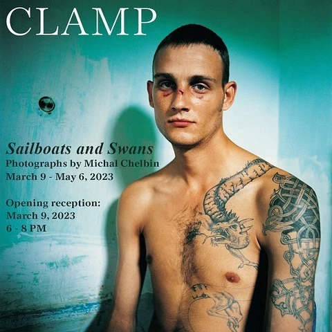 Art exhibition poster featuring a shirtless man with tattoos, advertising an event called 'Sailboats and Swans,' photography by Michal Chelbin.
