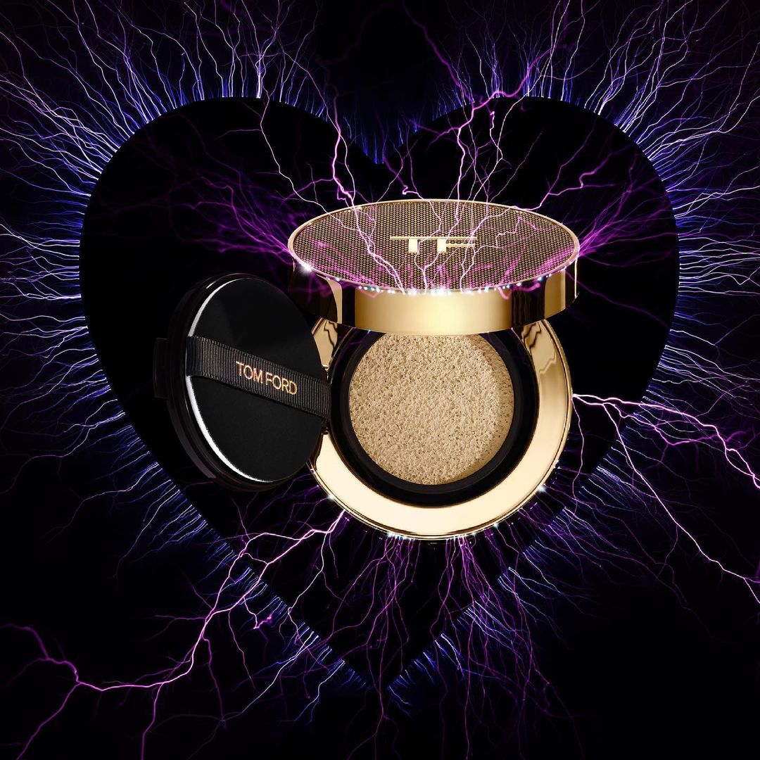Tom Ford foundation compact on a black backdrop with abstract purple electric lighting, focus on luxury cosmetics, golden accents.