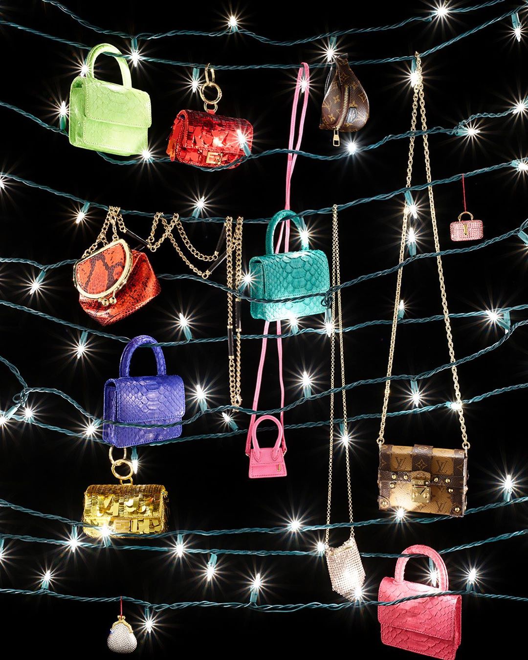 String of miniature handbags in various colors and textures, arranged amidst sparkling fairy lights against a dark background, fashion concept.