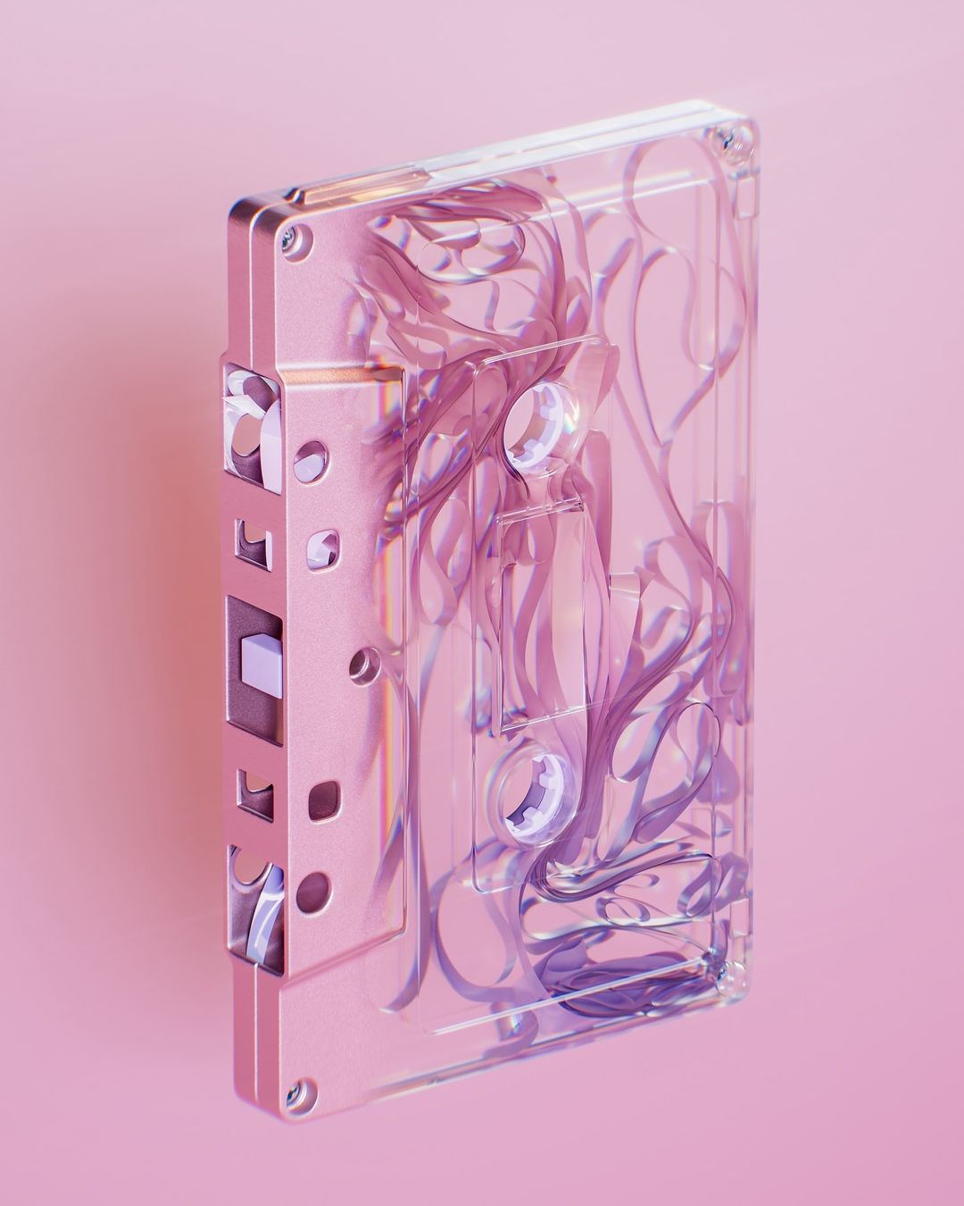 Close-up studio shot of a transparent audio cassette with a unique pink-colored tape inside on a pink background. Minimal design.