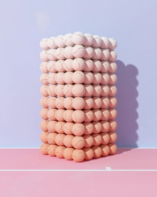 Stacked tennis balls create an unusual tower effect with color gradations in a whimsical studio shot against a pink and blue background.