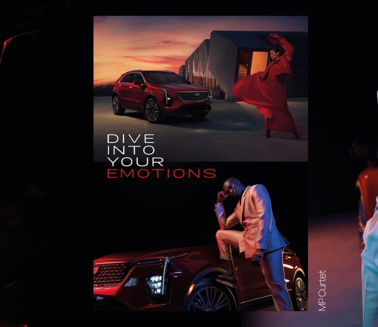 Automotive advertisement featuring a red Cadillac with an African American man in a suit and an African American woman in a dress.