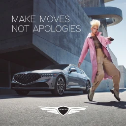 Model in pink trench coat and beige cargo pants dancing near a silver luxury car against modern concrete architecture