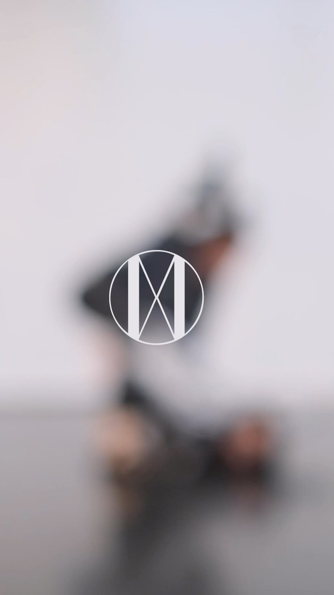 Abstract motion blur effect of a human figure against a white backdrop, creating a dynamic and artistic visual. 
