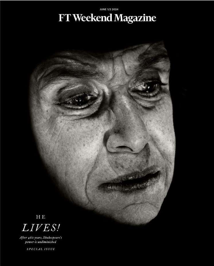 Black-and-white magazine cover features the close-up portrait of an older man with deep wrinkles, set against a stark, dark background.