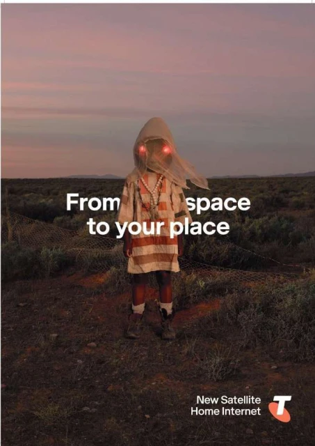 Person in hooded outfit stands in a field at dusk. This image features a blend of nature and mysterious fashion elements, set against a twilit sky.