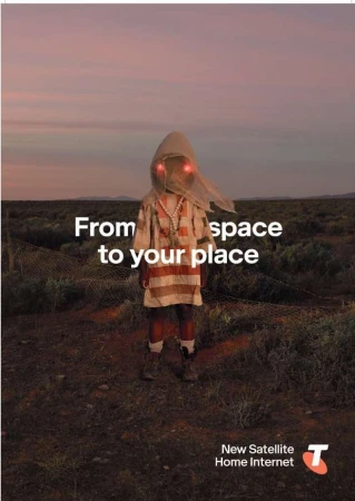 Person in hooded outfit stands in a field at dusk. This image features a blend of nature and mysterious fashion elements, set against a twilit sky.