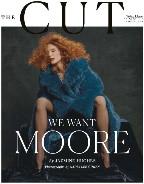 Magazine cover featuring a red-haired woman in a blue coat, seated on a black velvet surface, with 'The Cut' and issue details visible.