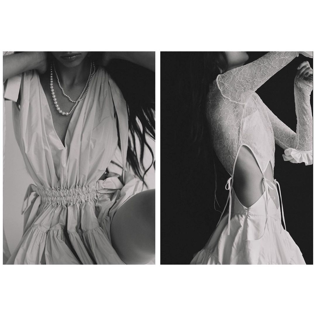 Black and white fashion shot: a woman in a light-colored dress and pearls is split with one side dark and another light.