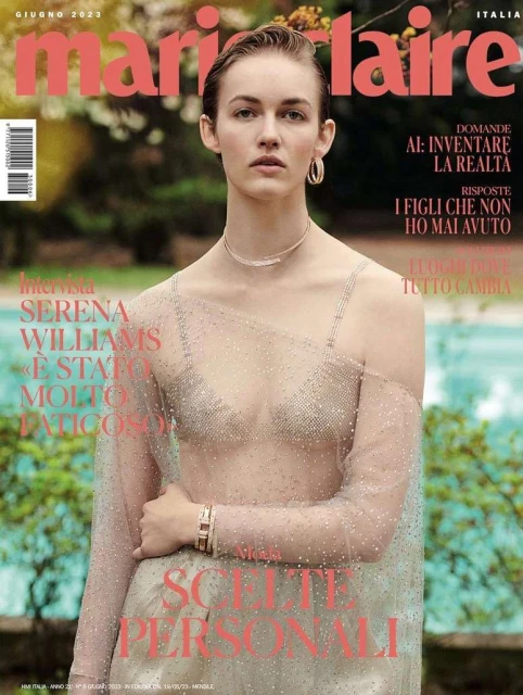 Marie Claire Italia cover featuring a woman wearing a sheer top in a garden setting with a swimming pool, showcasing fashion and beauty.