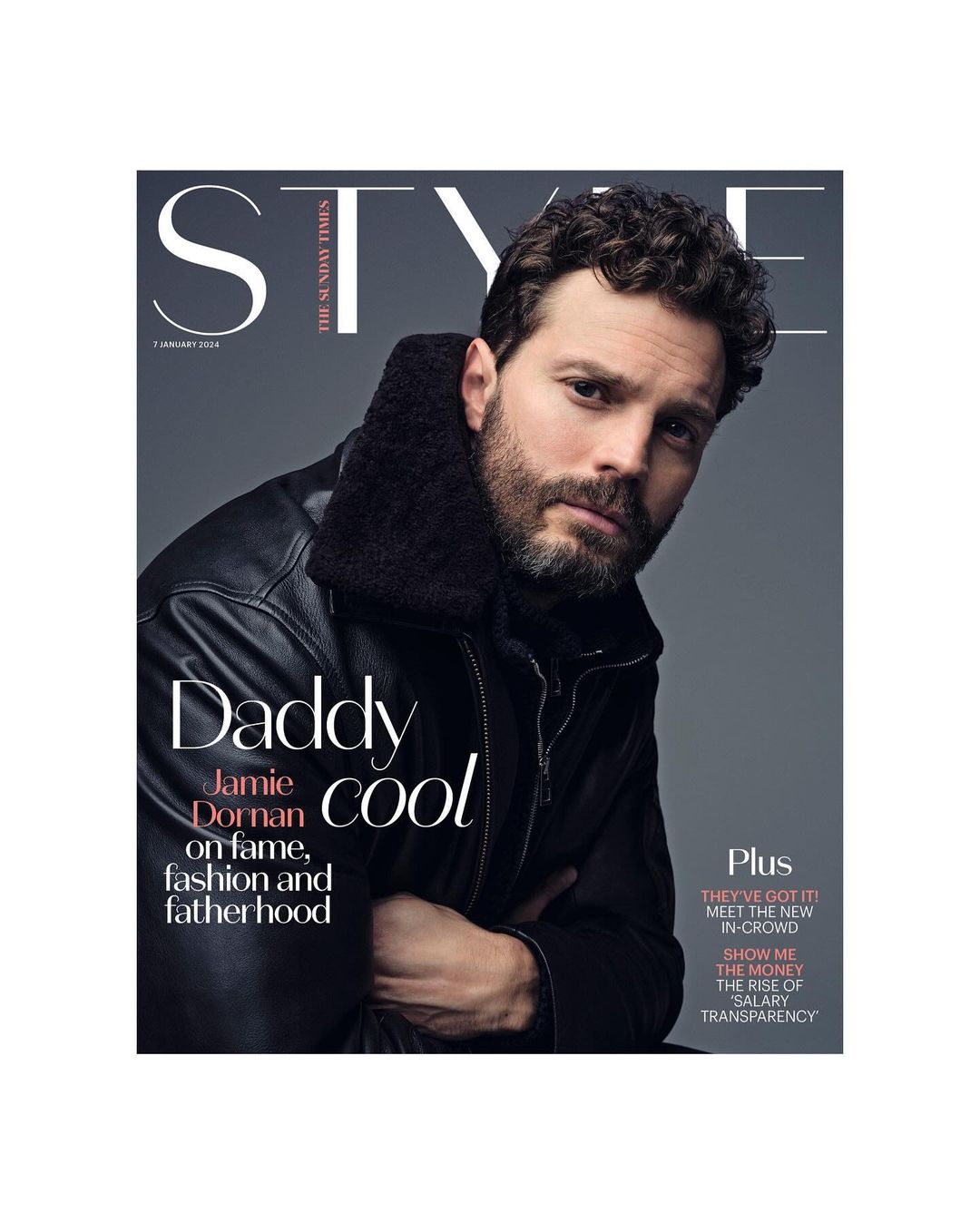 Jamie Dornan on the cover of The Sunday Times Style magazine, wearing a black leather jacket. Close-up shot, grey background, text overlays.