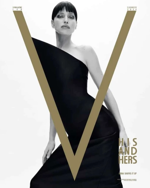 V Magazine cover featuring a woman in a black dress with gold V logo, shot in a photo studio with bright, even lighting.