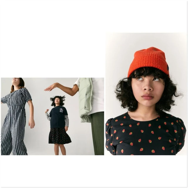 A group of three young women posing in a photo studio; one wears an orange beanie, and another wears a gingham dress.